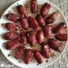 Töltött datolya baconba tekerve